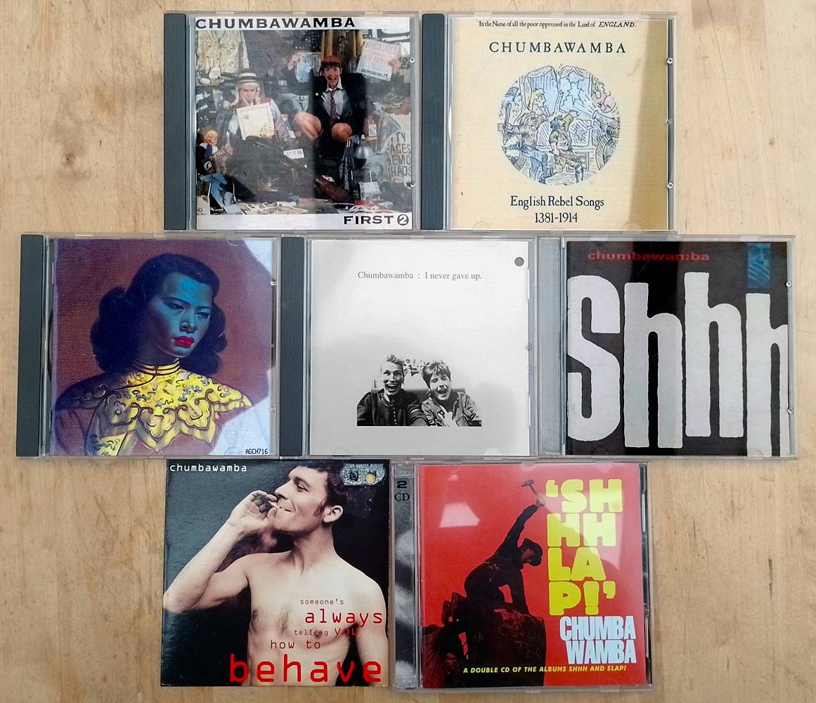 7 CDs by Chumbawamba: First 2, English Rebel Songs 1381-1914, Slap!, I never gave up, Shhh, Someone's always telling you how to behave, and Shhhlap!