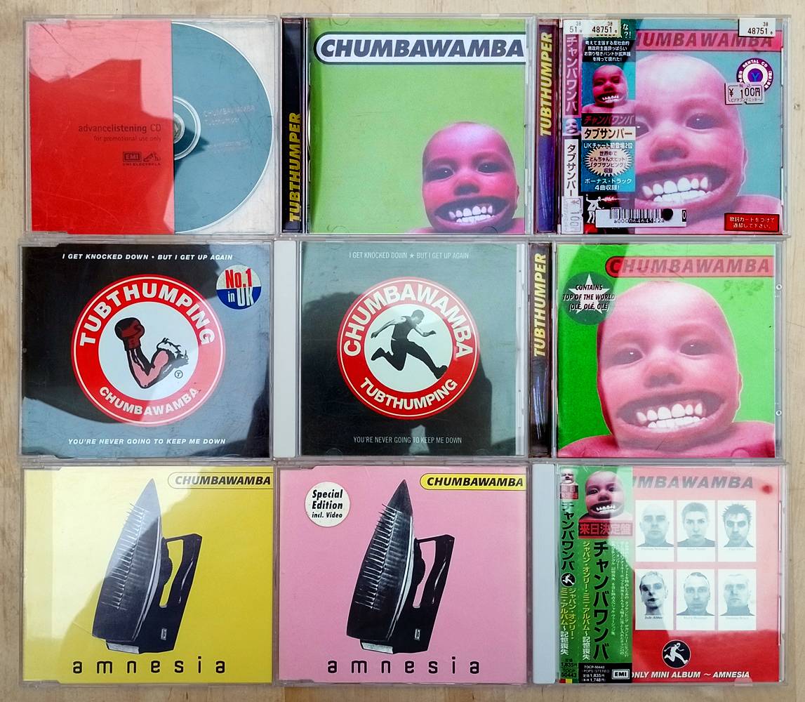 9 CDs by Chumbawamba: Tubthumper Advances listening promo copy, Tubthumper 1997 US, Tubthumper 1997 Japan, Tubthumping UK, Tubthumping US, Tubthumper 1998 EU, Amnesia EU yellow, Amnesia EU pink, Amnesia Japan Only Mini album